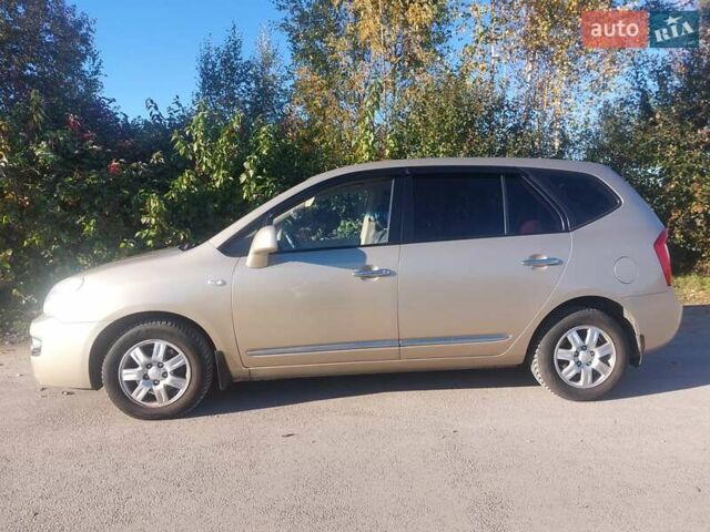 Бежевий Кіа Каренс, об'ємом двигуна 2 л та пробігом 319 тис. км за 5800 $, фото 4 на Automoto.ua