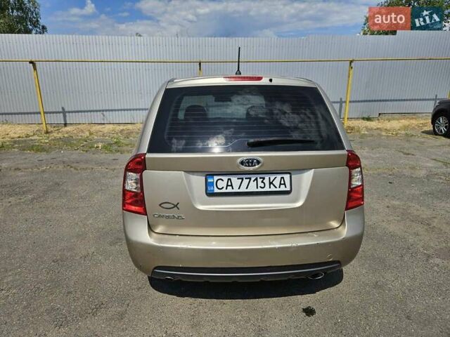 Бежевий Кіа Каренс, об'ємом двигуна 2 л та пробігом 287 тис. км за 4500 $, фото 16 на Automoto.ua