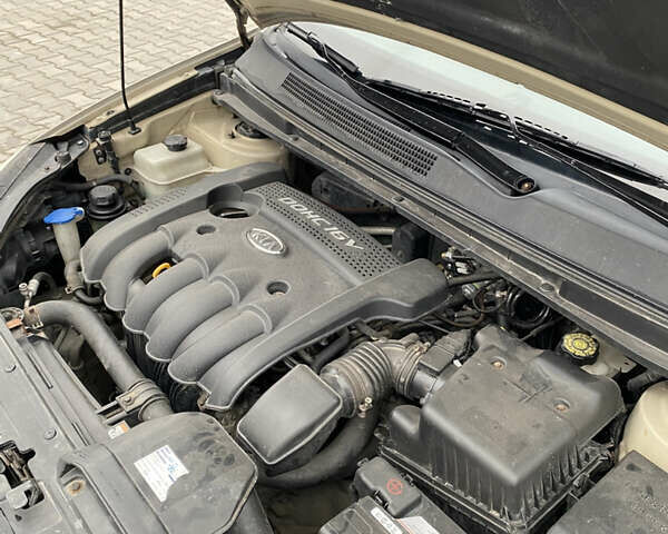 Бежевый Киа Каренс, объемом двигателя 1.98 л и пробегом 195 тыс. км за 6300 $, фото 6 на Automoto.ua