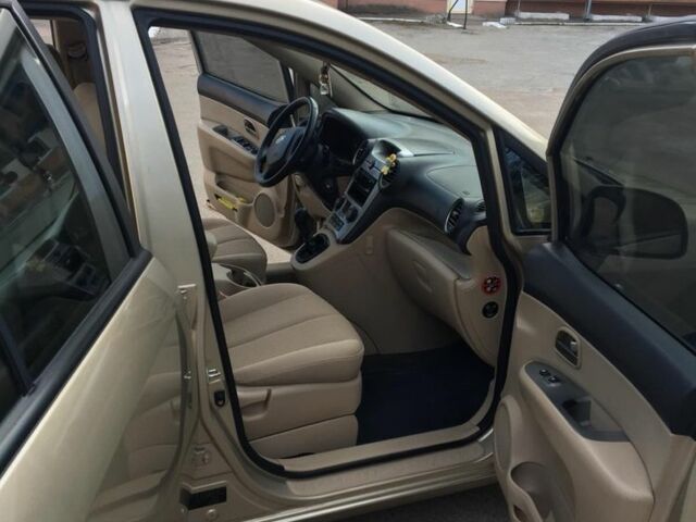 Бежевий Кіа Каренс, об'ємом двигуна 2 л та пробігом 237 тис. км за 5650 $, фото 17 на Automoto.ua