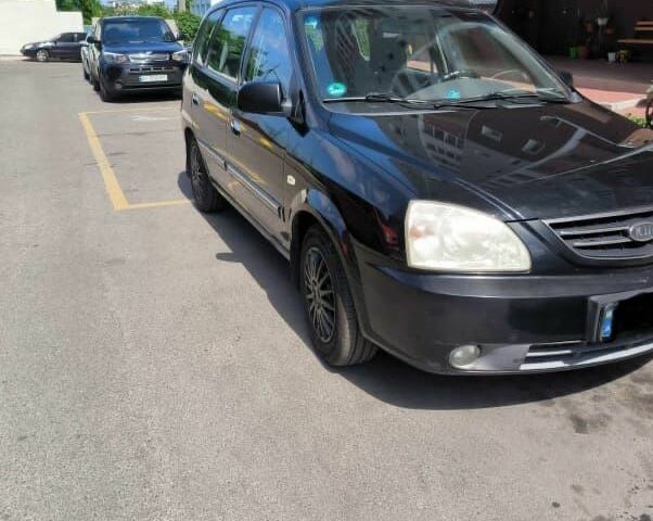 Черный Киа Каренс, объемом двигателя 1.8 л и пробегом 290 тыс. км за 3940 $, фото 6 на Automoto.ua