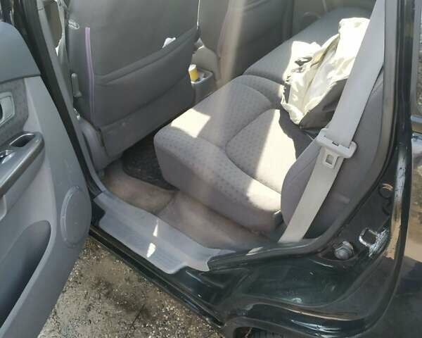 Чорний Кіа Каренс, об'ємом двигуна 1.8 л та пробігом 260 тис. км за 3618 $, фото 17 на Automoto.ua