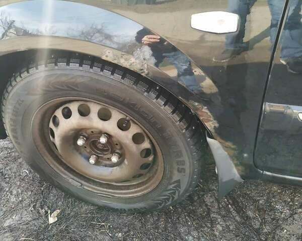 Чорний Кіа Каренс, об'ємом двигуна 1.8 л та пробігом 260 тис. км за 3618 $, фото 24 на Automoto.ua
