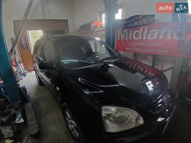 Киа Каренс 2005 в Киеве на Automoto.ua Черный Киа Каренс, объемом двигателя 2 л и пробегом 190 тыс. км за 4499 $, фото 3 на Automoto.ua