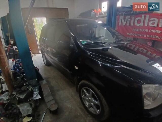 Киа Каренс 2005 в Киеве на Automoto.ua Черный Киа Каренс, объемом двигателя 2 л и пробегом 190 тыс. км за 4499 $, фото 2 на Automoto.ua