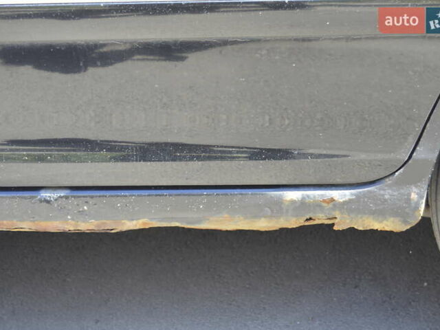 Черный Киа Каренс, объемом двигателя 2 л и пробегом 180 тыс. км за 3800 $, фото 4 на Automoto.ua