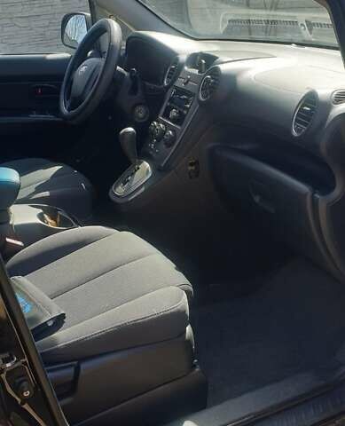 Киа Каренс 2006 в Запорожье на Automoto.ua Черный Киа Каренс, объемом двигателя 2 л и пробегом 224 тыс. км за 5500 $, фото 5 на Automoto.ua