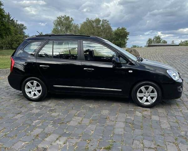 Чорний Кіа Каренс, об'ємом двигуна 2 л та пробігом 188 тис. км за 7200 $, фото 3 на Automoto.ua