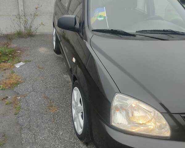 Чорний Кіа Каренс, об'ємом двигуна 1.98 л та пробігом 288 тис. км за 4500 $, фото 2 на Automoto.ua