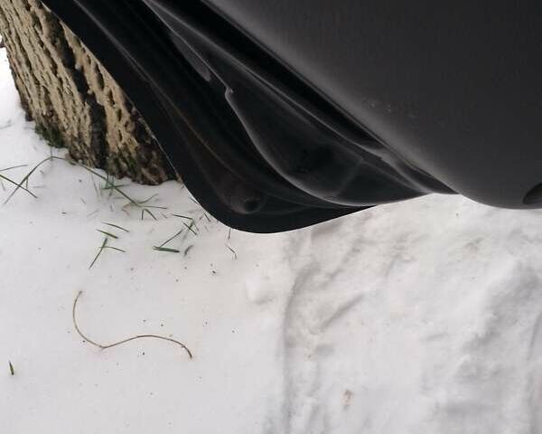 Черный Киа Каренс, объемом двигателя 2 л и пробегом 320 тыс. км за 5830 $, фото 18 на Automoto.ua