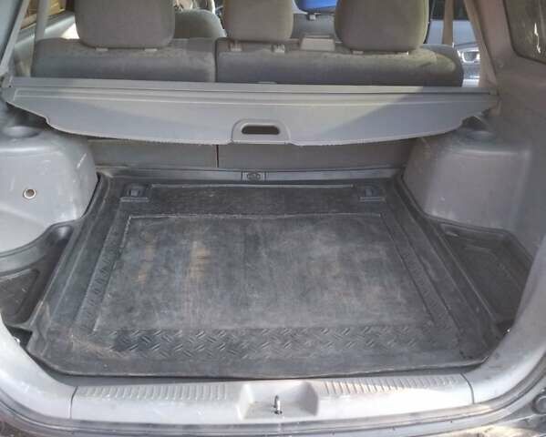 Черный Киа Каренс, объемом двигателя 2 л и пробегом 320 тыс. км за 5830 $, фото 22 на Automoto.ua