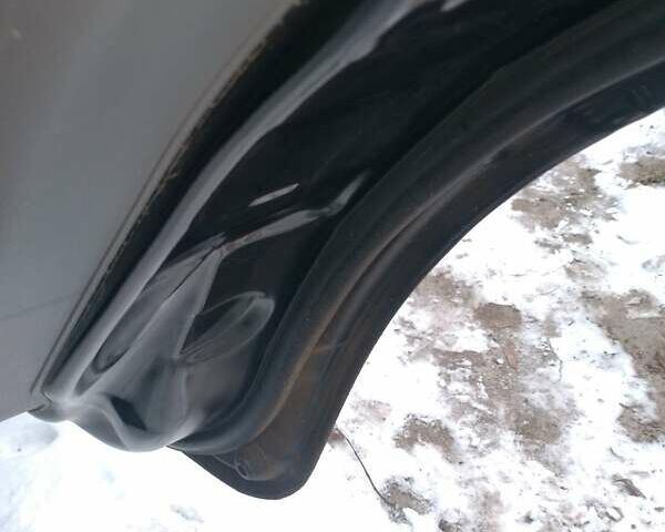 Черный Киа Каренс, объемом двигателя 2 л и пробегом 320 тыс. км за 5830 $, фото 16 на Automoto.ua