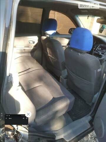 Черный Киа Каренс, объемом двигателя 2 л и пробегом 320 тыс. км за 5830 $, фото 13 на Automoto.ua