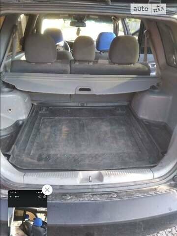 Черный Киа Каренс, объемом двигателя 2 л и пробегом 320 тыс. км за 5830 $, фото 12 на Automoto.ua