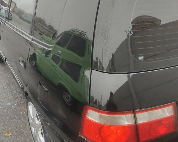 Киа Каренс 2006 в Виннице на Automoto.ua Черный Киа Каренс, объемом двигателя 1.98 л и пробегом 291 тыс. км за 4600 $, фото 4 на Automoto.ua