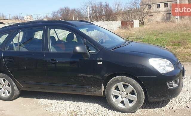 Киа Каренс 2006 в Запорожье на Automoto.ua Черный Киа Каренс, объемом двигателя 2 л и пробегом 224 тыс. км за 5500 $, фото 3 на Automoto.ua