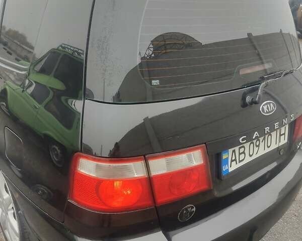 Чорний Кіа Каренс, об'ємом двигуна 1.98 л та пробігом 288 тис. км за 4500 $, фото 3 на Automoto.ua