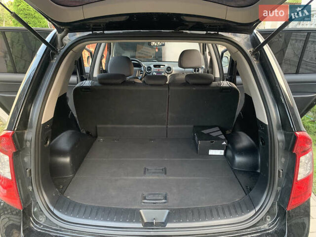 Чорний Кіа Каренс, об'ємом двигуна 2 л та пробігом 199 тис. км за 6400 $, фото 1 на Automoto.ua