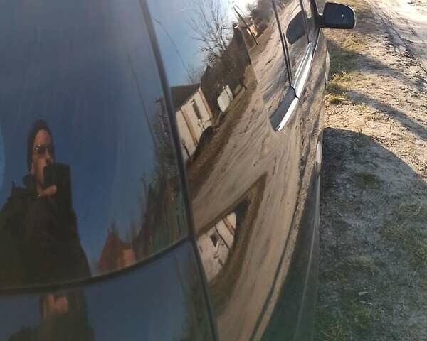 Черный Киа Каренс, объемом двигателя 2 л и пробегом 320 тыс. км за 5830 $, фото 24 на Automoto.ua