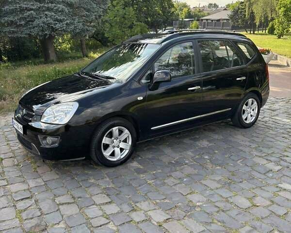 Чорний Кіа Каренс, об'ємом двигуна 2 л та пробігом 188 тис. км за 7200 $, фото 1 на Automoto.ua