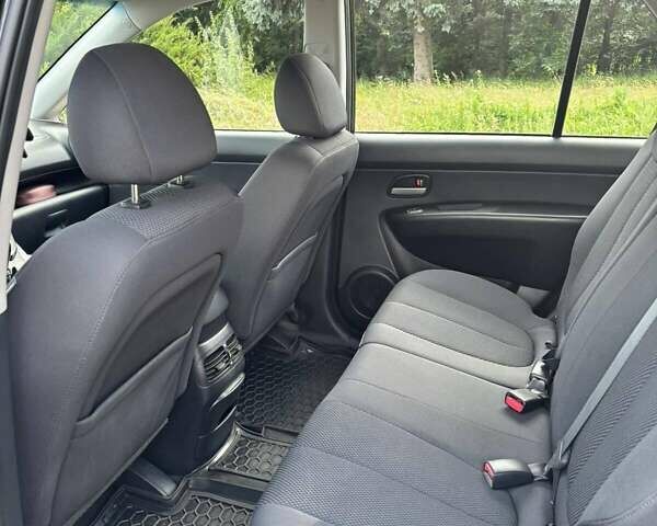 Чорний Кіа Каренс, об'ємом двигуна 2 л та пробігом 188 тис. км за 7200 $, фото 9 на Automoto.ua