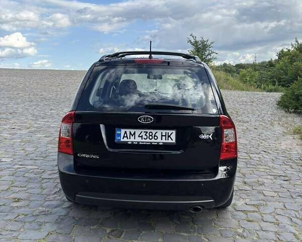 Чорний Кіа Каренс, об'ємом двигуна 2 л та пробігом 188 тис. км за 7200 $, фото 5 на Automoto.ua
