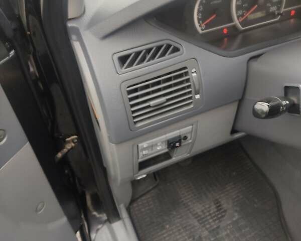 Чорний Кіа Каренс, об'ємом двигуна 1.98 л та пробігом 288 тис. км за 4500 $, фото 13 на Automoto.ua