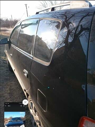 Черный Киа Каренс, объемом двигателя 2 л и пробегом 320 тыс. км за 5830 $, фото 10 на Automoto.ua