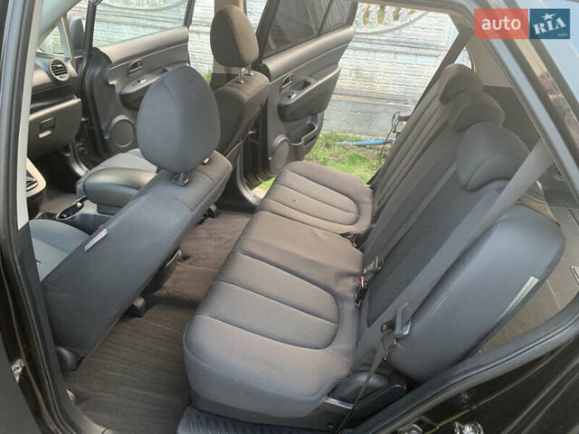 Чорний Кіа Каренс, об'ємом двигуна 2 л та пробігом 199 тис. км за 6400 $, фото 3 на Automoto.ua