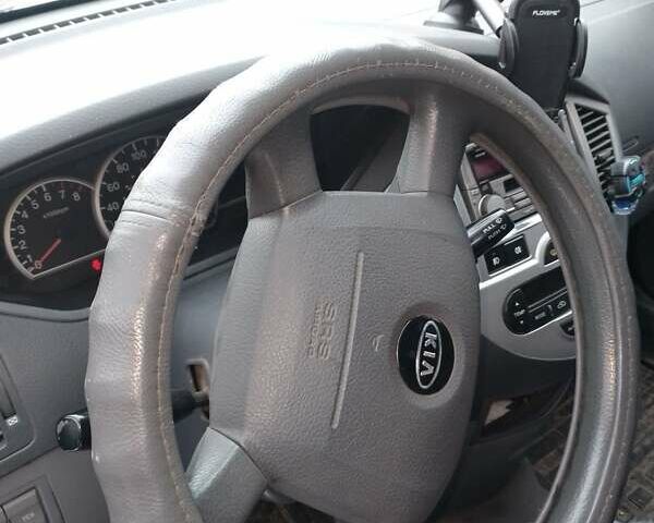 Черный Киа Каренс, объемом двигателя 2 л и пробегом 320 тыс. км за 5830 $, фото 6 на Automoto.ua