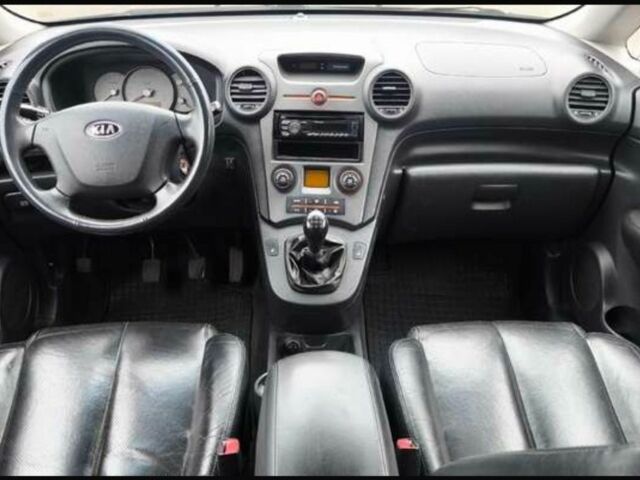 Черный Киа Каренс, объемом двигателя 2 л и пробегом 299 тыс. км за 3000 $, фото 3 на Automoto.ua