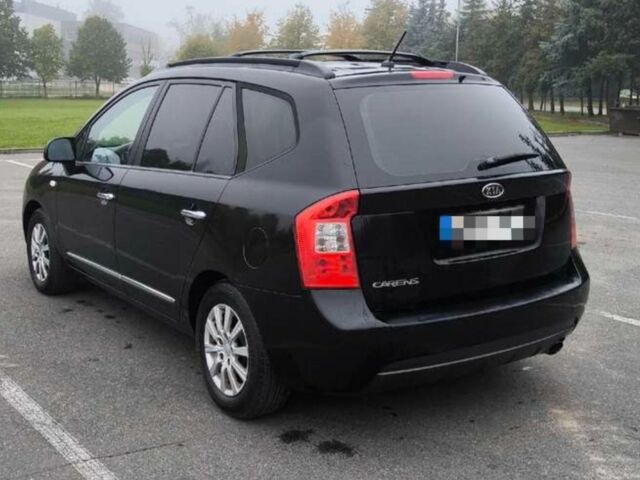 Черный Киа Каренс, объемом двигателя 2 л и пробегом 299 тыс. км за 3000 $, фото 5 на Automoto.ua