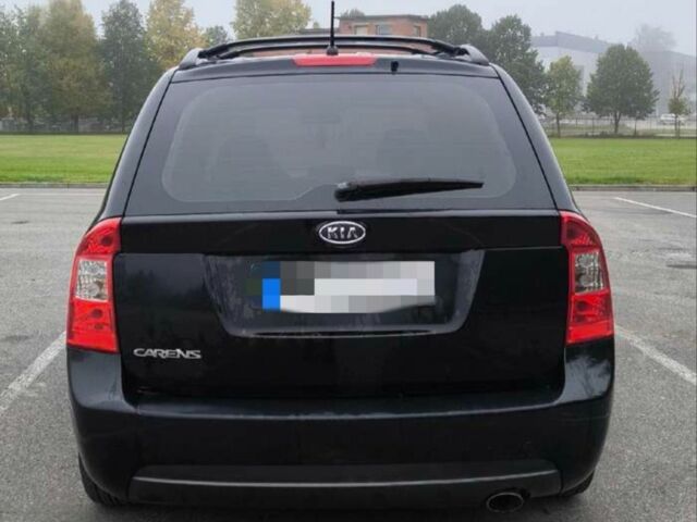Черный Киа Каренс, объемом двигателя 2 л и пробегом 299 тыс. км за 3000 $, фото 11 на Automoto.ua