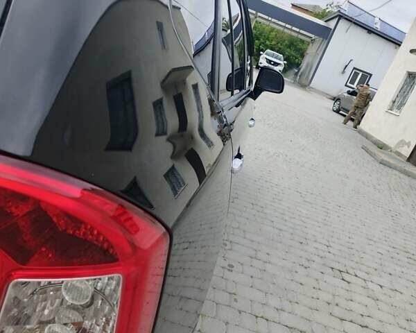 Чорний Кіа Каренс, об'ємом двигуна 2 л та пробігом 197 тис. км за 6450 $, фото 8 на Automoto.ua