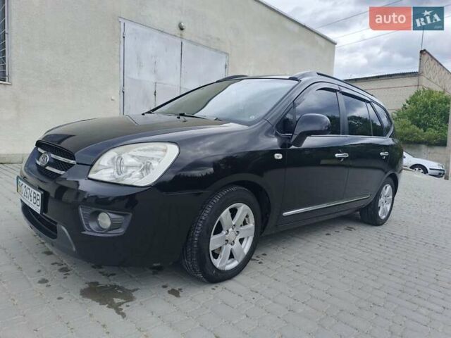 Чорний Кіа Каренс, об'ємом двигуна 2 л та пробігом 197 тис. км за 6450 $, фото 5 на Automoto.ua