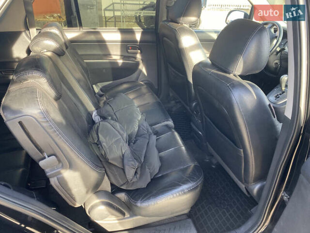 Чорний Кіа Каренс, об'ємом двигуна 2 л та пробігом 229 тис. км за 6900 $, фото 9 на Automoto.ua