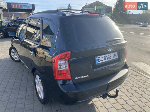 Чорний Кіа Каренс, об'ємом двигуна 2 л та пробігом 229 тис. км за 6900 $, фото 3 на Automoto.ua
