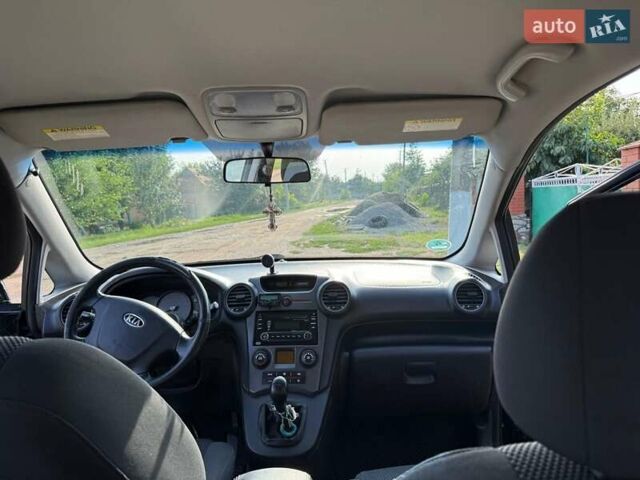 Черный Киа Каренс, объемом двигателя 2 л и пробегом 300 тыс. км за 5500 $, фото 7 на Automoto.ua
