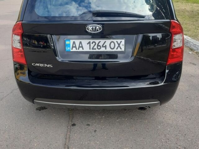 Чорний Кіа Каренс, об'ємом двигуна 2 л та пробігом 185 тис. км за 6000 $, фото 3 на Automoto.ua