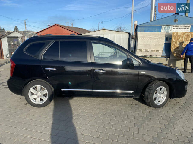 Чорний Кіа Каренс, об'ємом двигуна 2 л та пробігом 229 тис. км за 6900 $, фото 6 на Automoto.ua