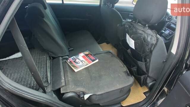 Чорний Кіа Каренс, об'ємом двигуна 2 л та пробігом 265 тис. км за 5800 $, фото 11 на Automoto.ua