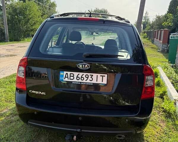 Черный Киа Каренс, объемом двигателя 2 л и пробегом 300 тыс. км за 5500 $, фото 14 на Automoto.ua