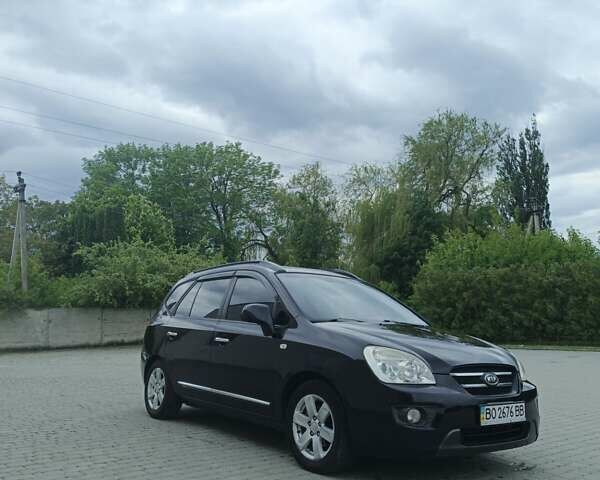 Чорний Кіа Каренс, об'ємом двигуна 2 л та пробігом 197 тис. км за 6450 $, фото 1 на Automoto.ua