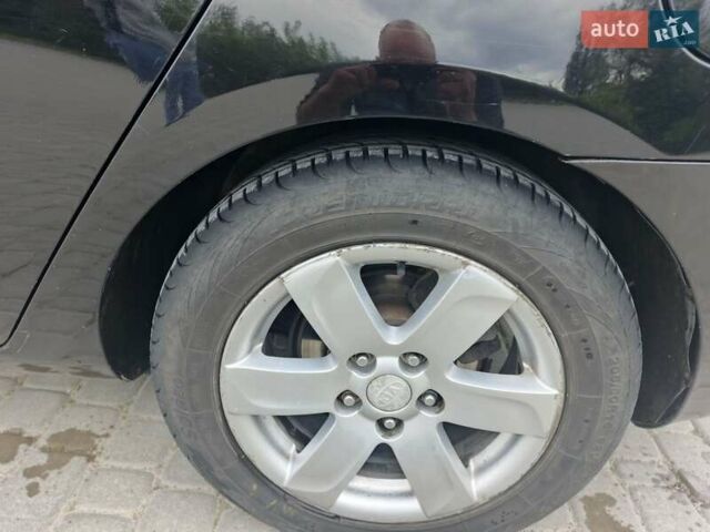 Чорний Кіа Каренс, об'ємом двигуна 2 л та пробігом 197 тис. км за 6450 $, фото 7 на Automoto.ua