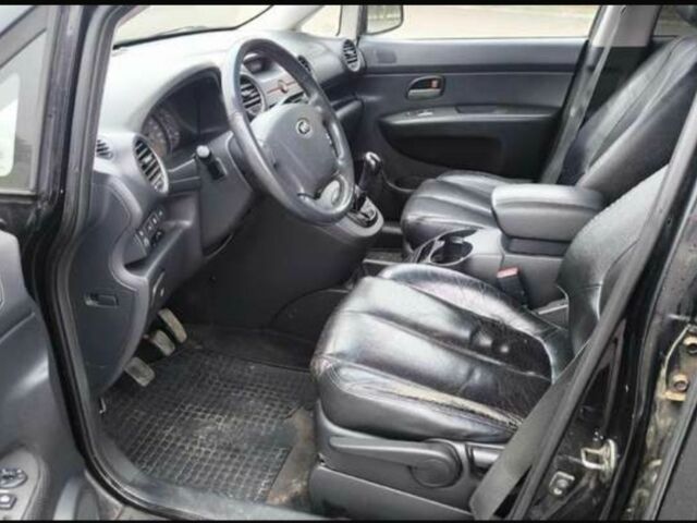 Черный Киа Каренс, объемом двигателя 2 л и пробегом 299 тыс. км за 3000 $, фото 8 на Automoto.ua