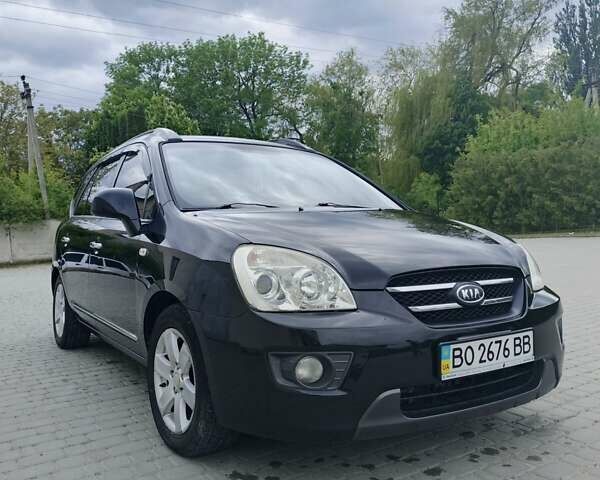 Чорний Кіа Каренс, об'ємом двигуна 2 л та пробігом 197 тис. км за 6450 $, фото 6 на Automoto.ua