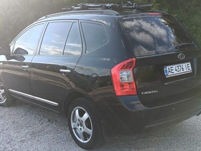 Чорний Кіа Каренс, об'ємом двигуна 2 л та пробігом 265 тис. км за 5800 $, фото 3 на Automoto.ua
