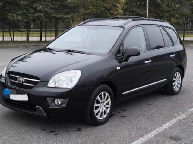 Черный Киа Каренс, объемом двигателя 2 л и пробегом 299 тыс. км за 3000 $, фото 1 на Automoto.ua