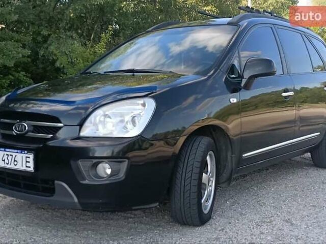 Чорний Кіа Каренс, об'ємом двигуна 2 л та пробігом 265 тис. км за 5800 $, фото 7 на Automoto.ua