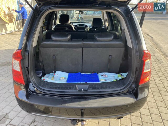 Чорний Кіа Каренс, об'ємом двигуна 2 л та пробігом 229 тис. км за 6900 $, фото 11 на Automoto.ua